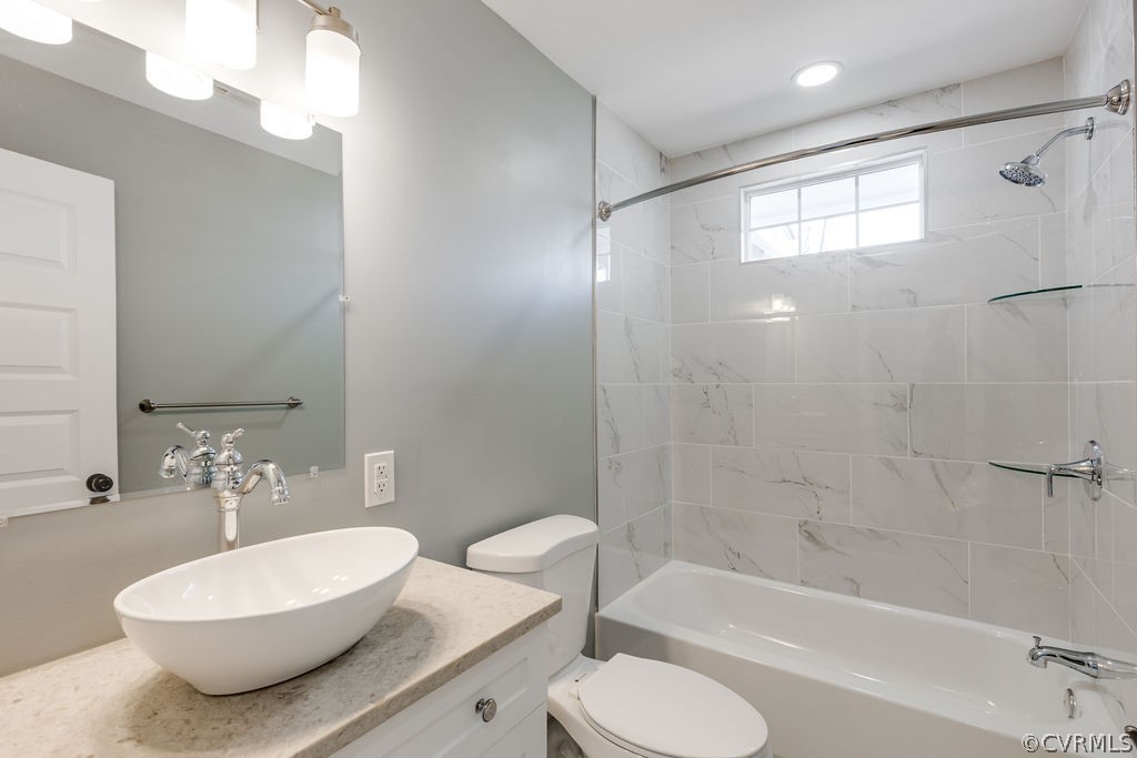 3301 West Hundred Road Chester, VA 23831 - Photo 6 of 15 a bathroom with a sink a toilet and bathtub
