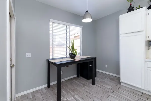 a room with window and wooden floor