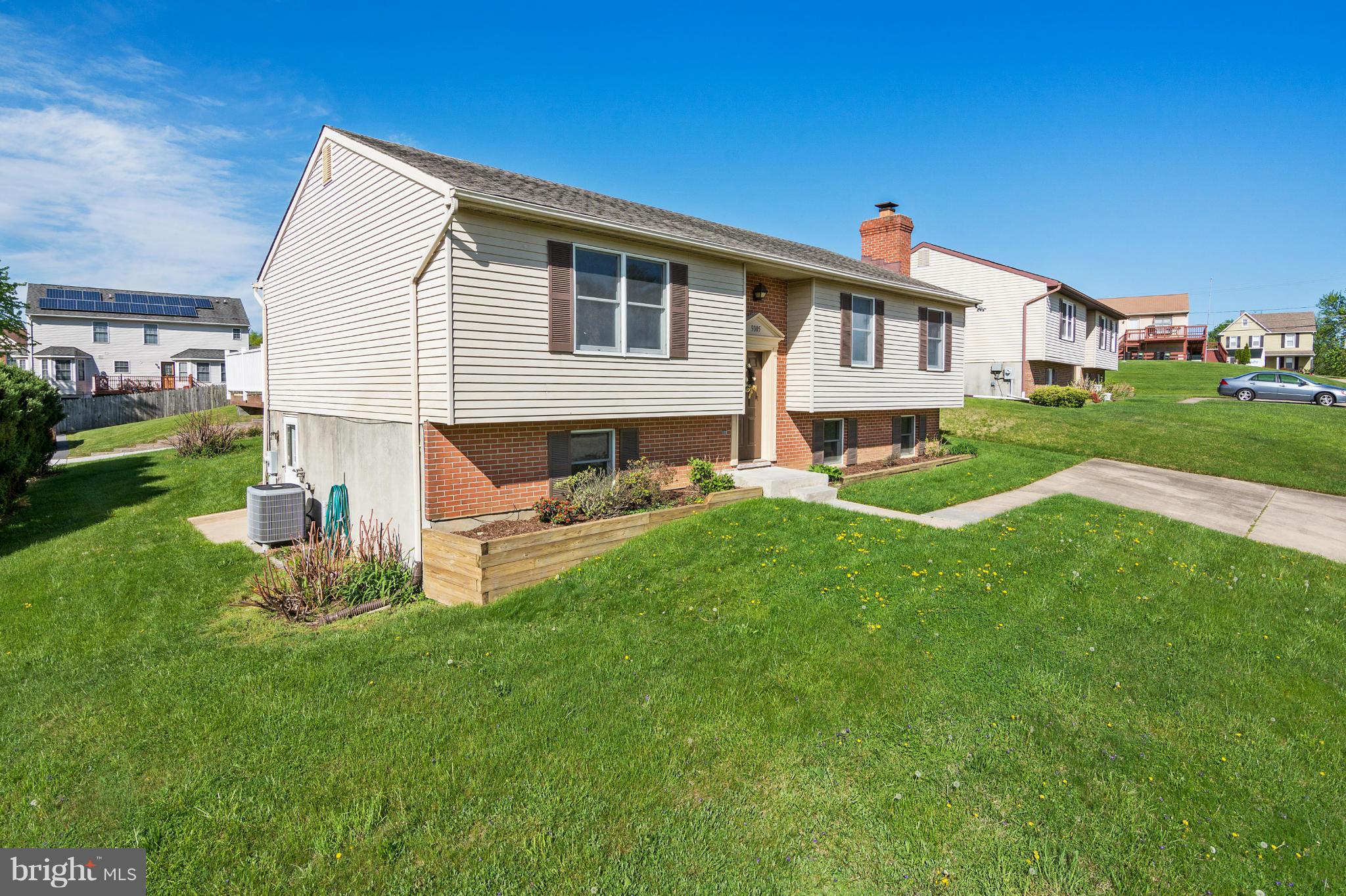9005 Throgmorton Road Baltimore, MD 21234 - Photo 2 of 30 a front view of house with yard and green space
