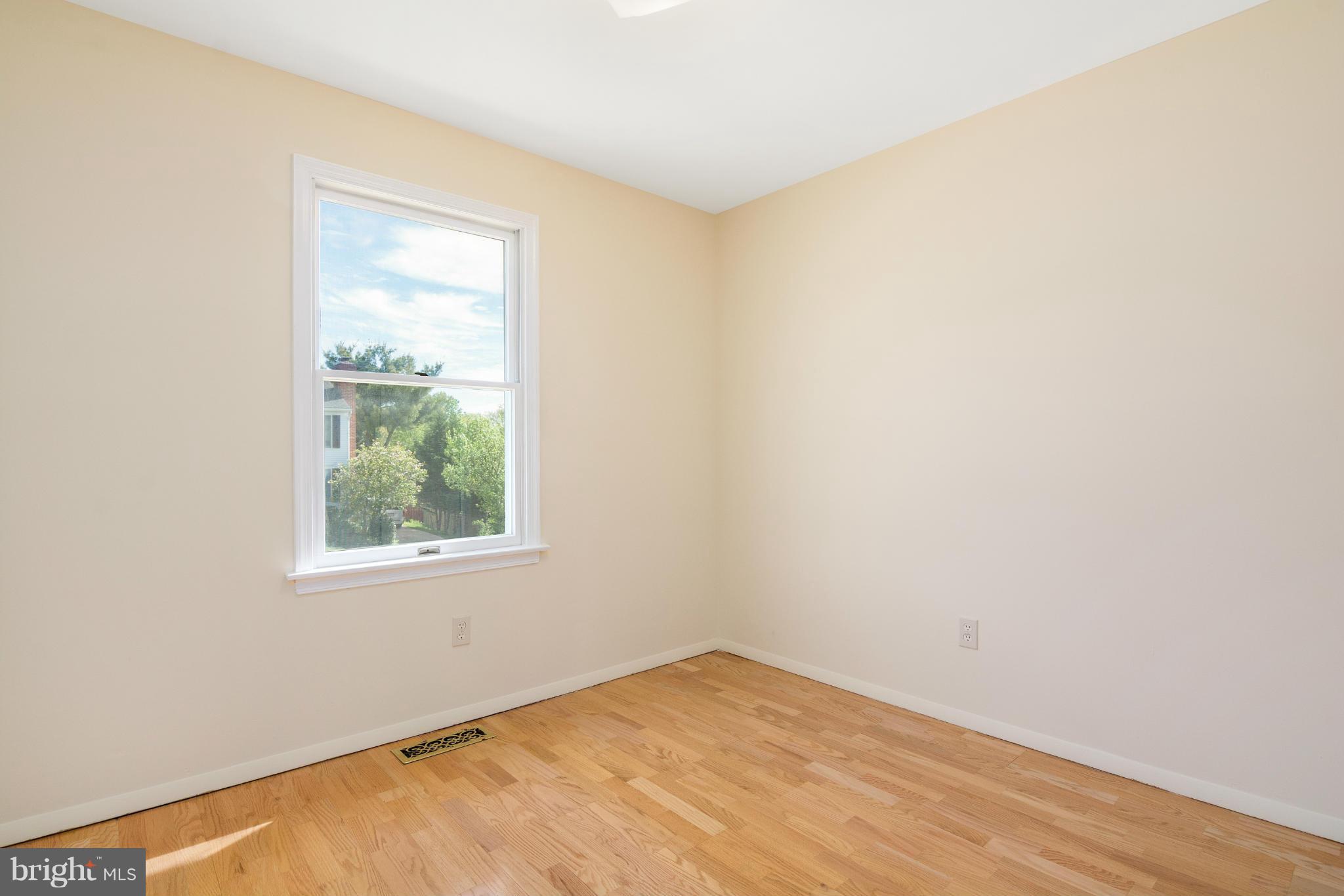 9005 Throgmorton Road Baltimore, MD 21234 - Photo 18 of 30 an empty room with a window