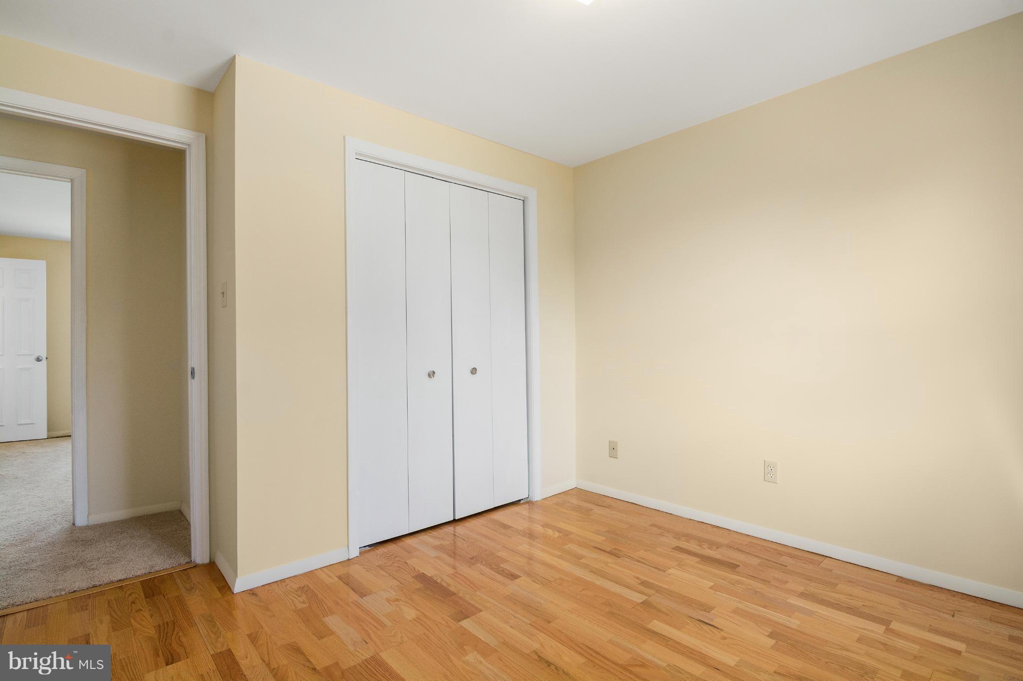 9005 Throgmorton Road Baltimore, MD 21234 - Photo 21 of 30 a view of empty room with wooden floor