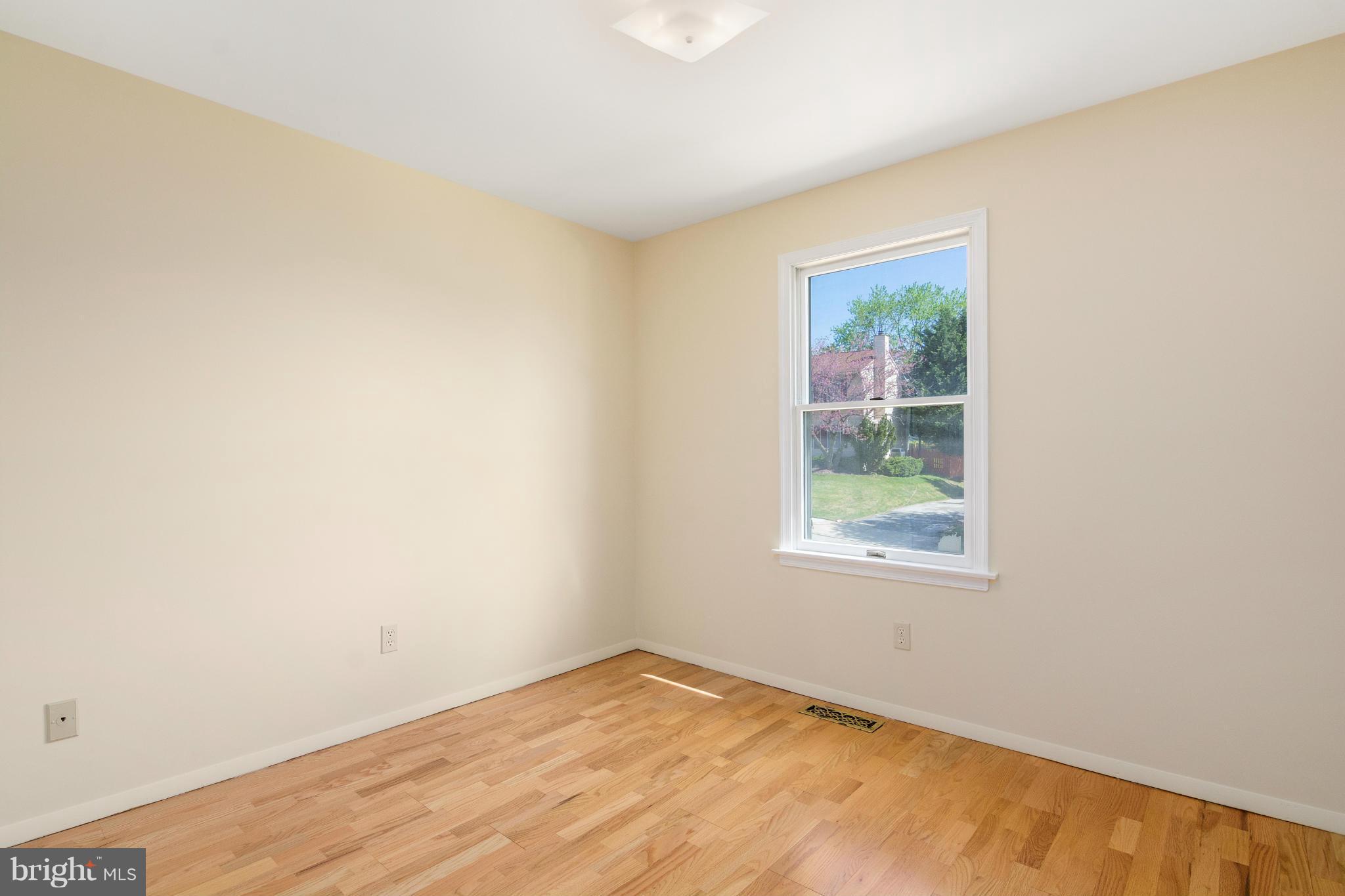 9005 Throgmorton Road Baltimore, MD 21234 - Photo 23 of 30 an empty room with a window