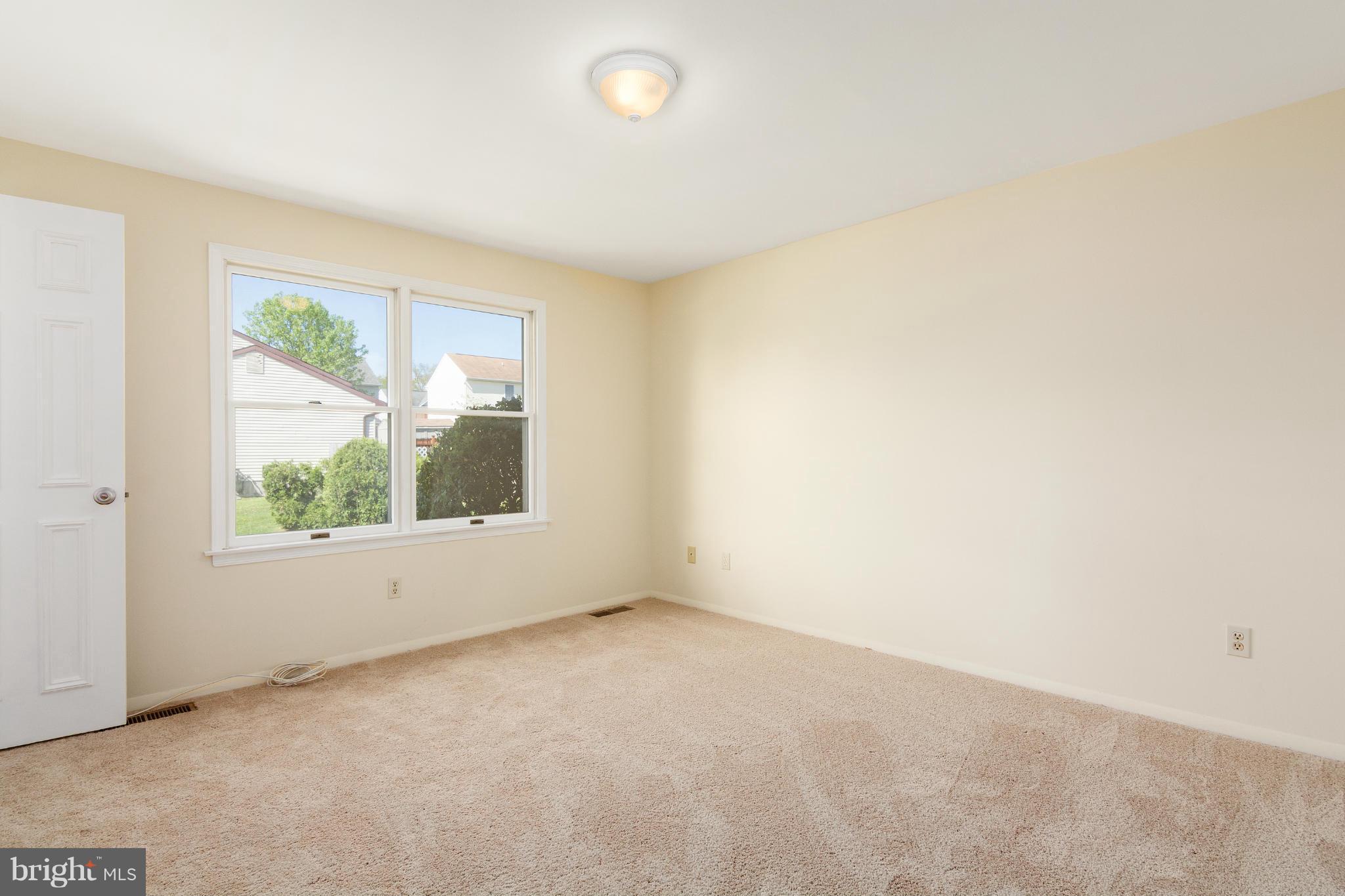 9005 Throgmorton Road Baltimore, MD 21234 - Photo 24 of 30 an empty room with windows