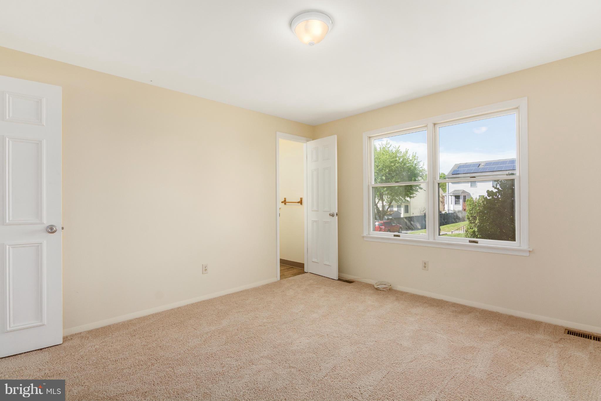 9005 Throgmorton Road Baltimore, MD 21234 - Photo 25 of 30 an empty room with windows