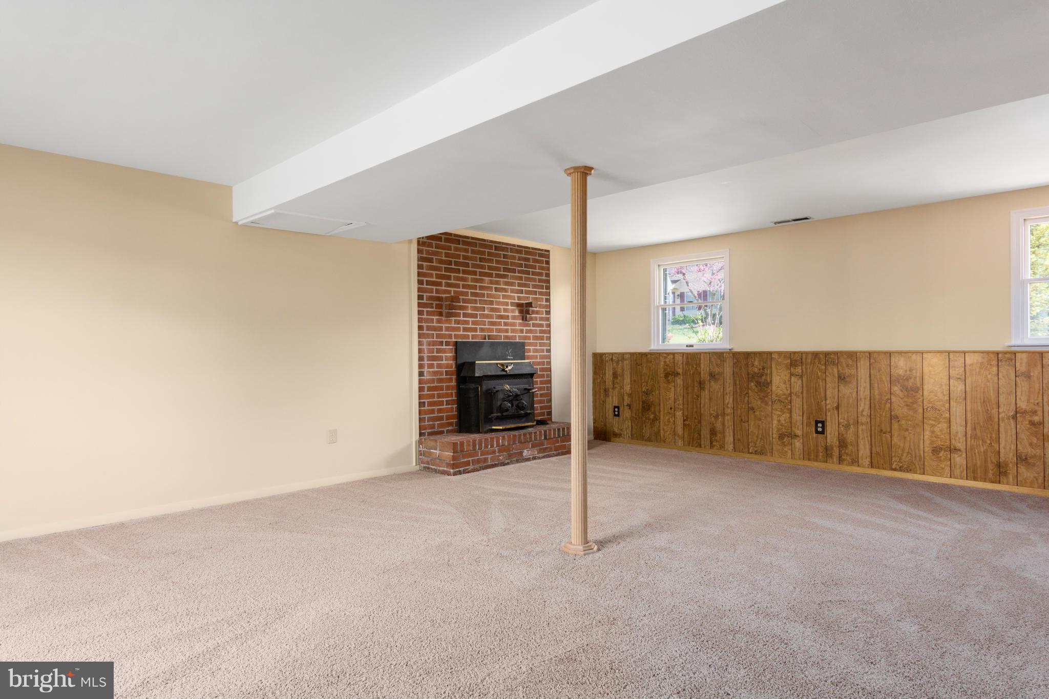 9005 Throgmorton Road Baltimore, MD 21234 - Photo 29 of 30 an empty room with sliding door