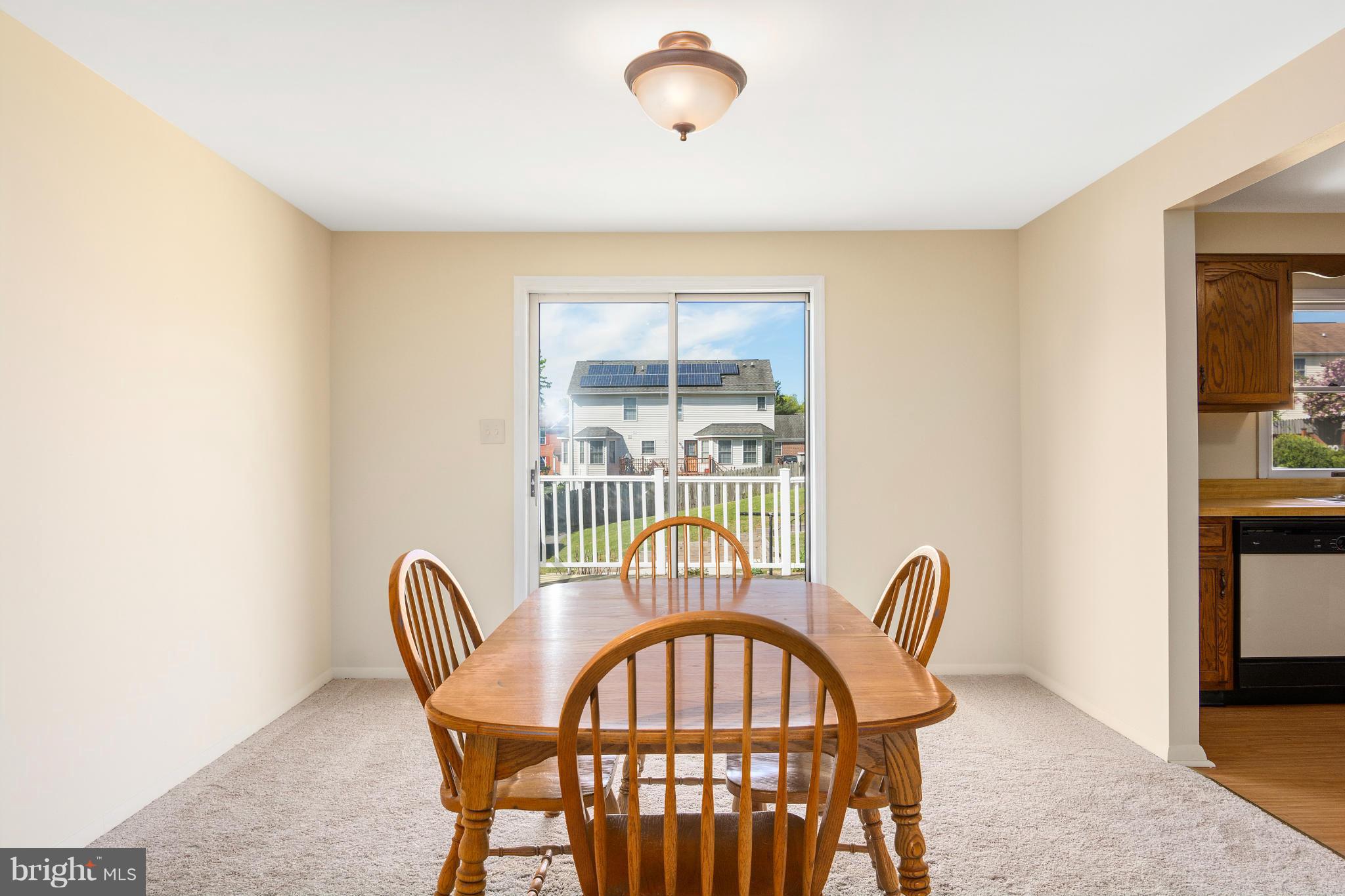 9005 Throgmorton Road Baltimore, MD 21234 - Photo 10 of 30 a view of a dining room with furniture window and outside view