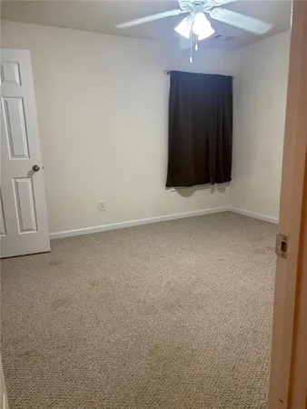 en empty room with a window