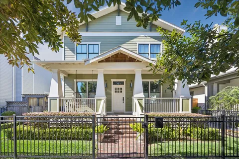 front view of a house with a large window