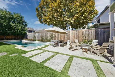 a view of a backyard with a patio