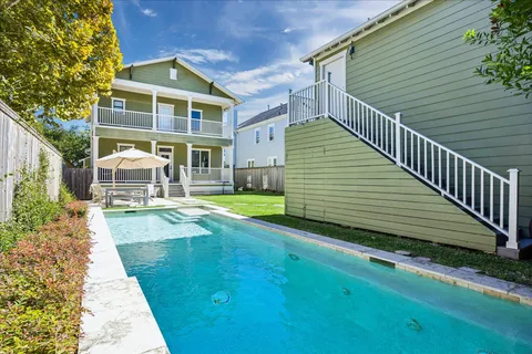 a view of a house with a swimming pool