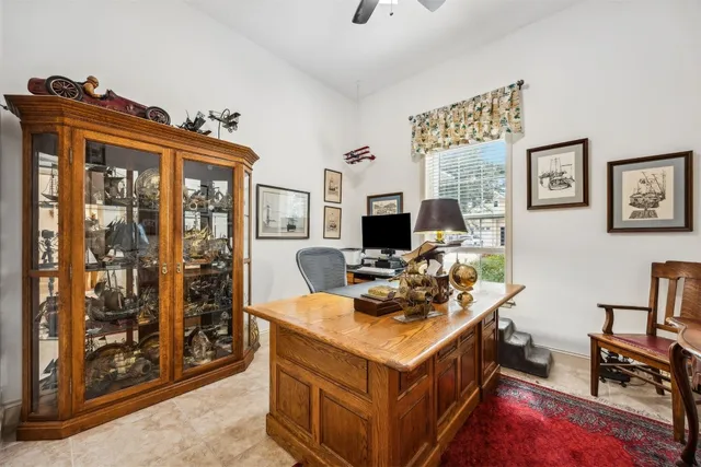 a view of living room filled with furniture and furniture