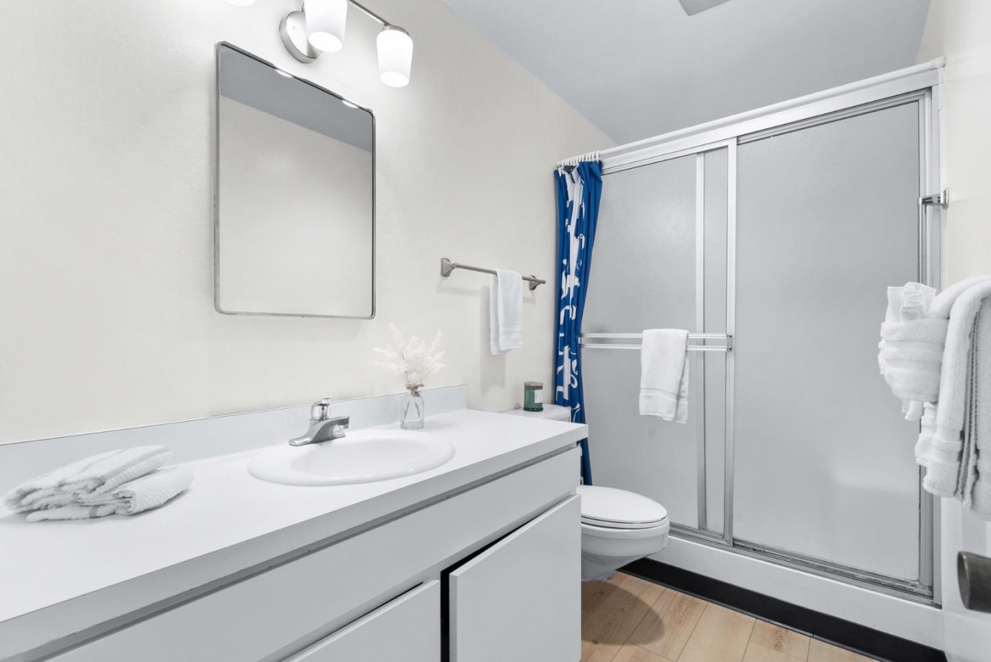 101 Shell Road, Unit 244 Watsonville, CA 95076 - Photo 20 of 32 a bathroom with a sink toilet and shower