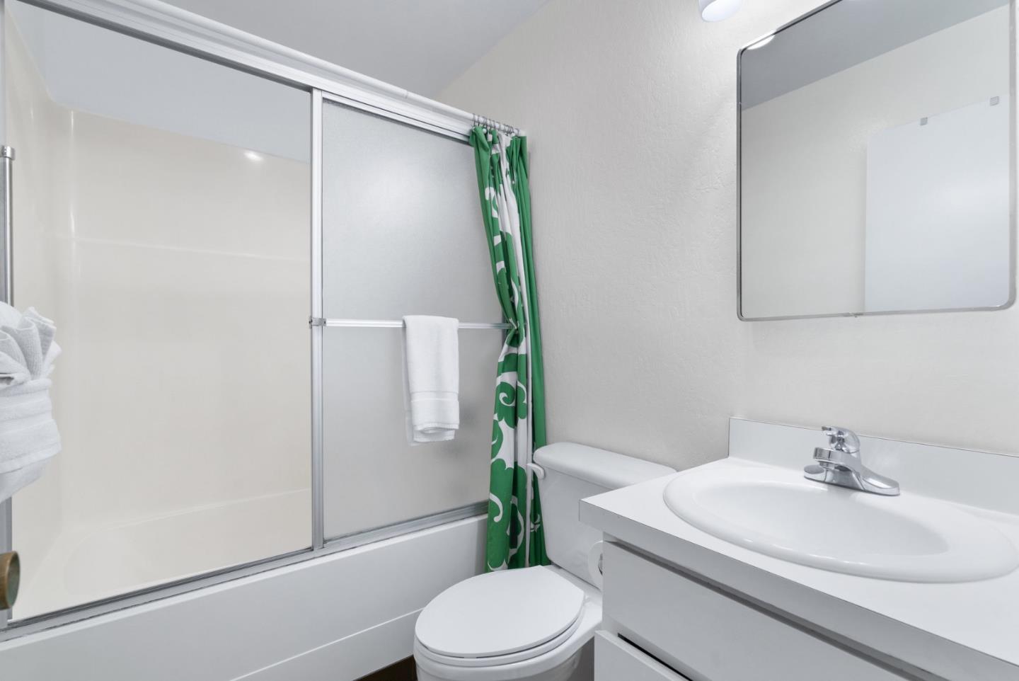 101 Shell Road, Unit 244 Watsonville, CA 95076 - Photo 23 of 32 a bathroom with a sink toilet and shower