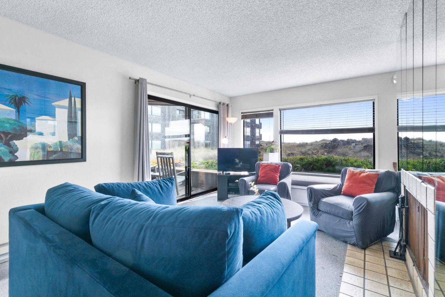 101 Shell Road, Unit 244 Watsonville, CA 95076 - Photo 5 of 32 a living room with furniture and a large window