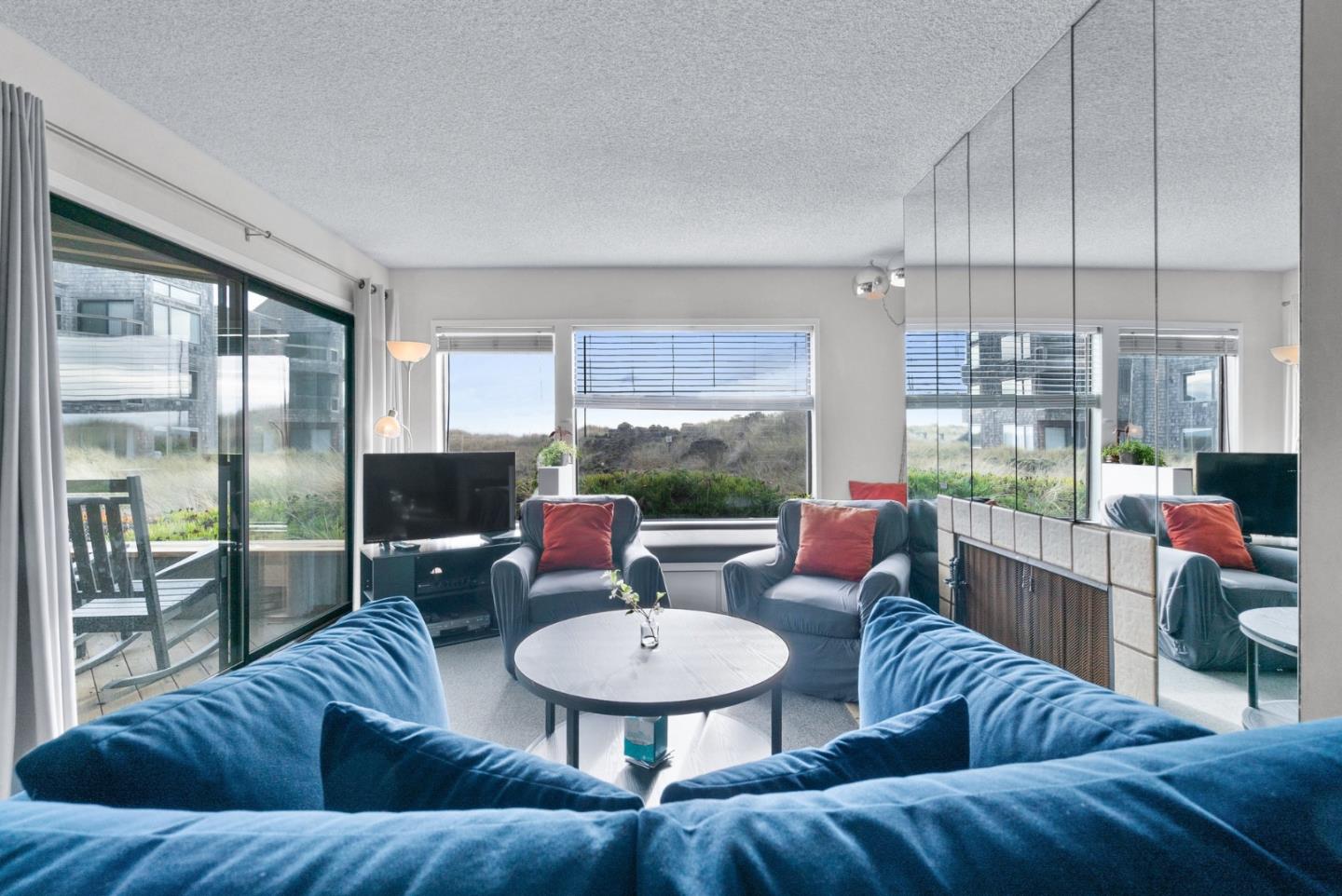 101 Shell Road, Unit 244 Watsonville, CA 95076 - Photo 7 of 32 a living room with furniture and a large window