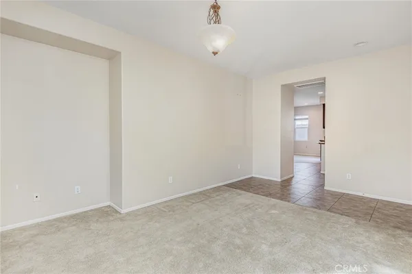 a kitchen with stainless steel appliances granite countertop a stove sink and cabinets