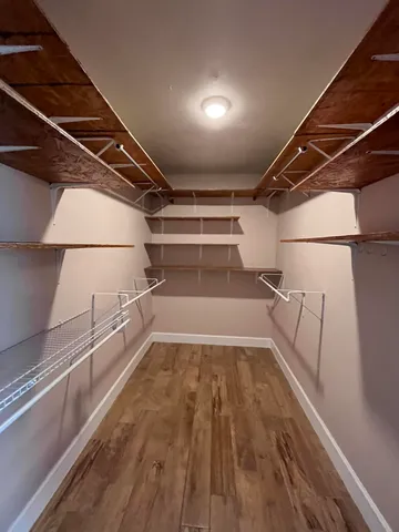 a view of a room with racks on the wall