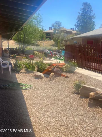 a white toilet sitting next to a bath tub and a shower