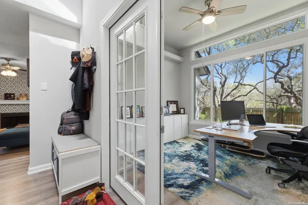 a room with furniture and a window