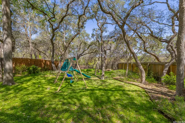 a view of swimming pool with a yard