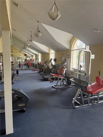 a view of a room with gym equipment