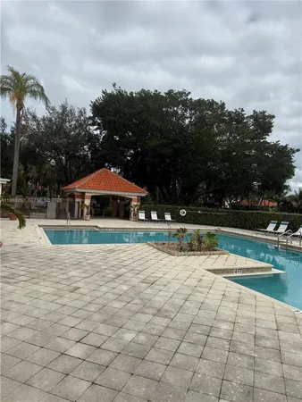 a view of a swimming pool and lake