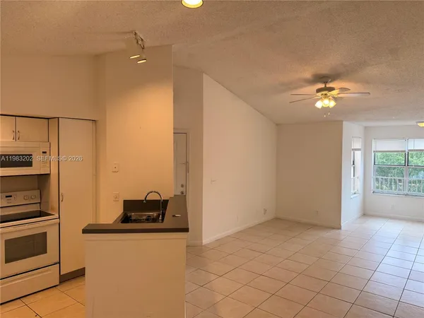 a very nice looking room with a ceiling fan