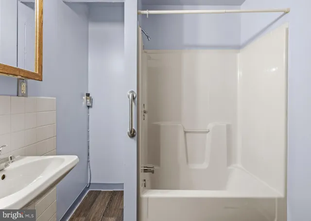 a bathroom with a sink and a bathtub