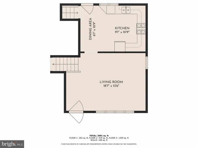 a picture of a bench in front of a wall