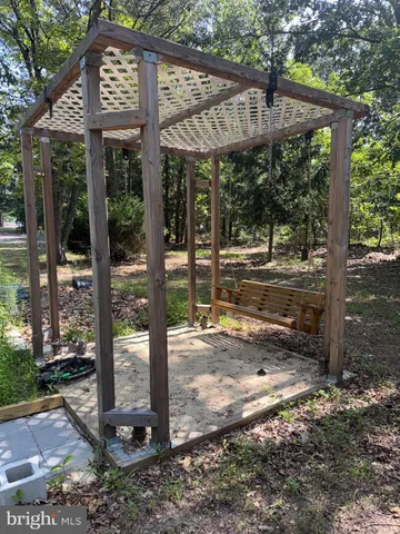 a view of a house with backyard from a porch