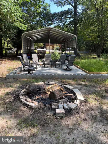 a view of a parked car in front of house