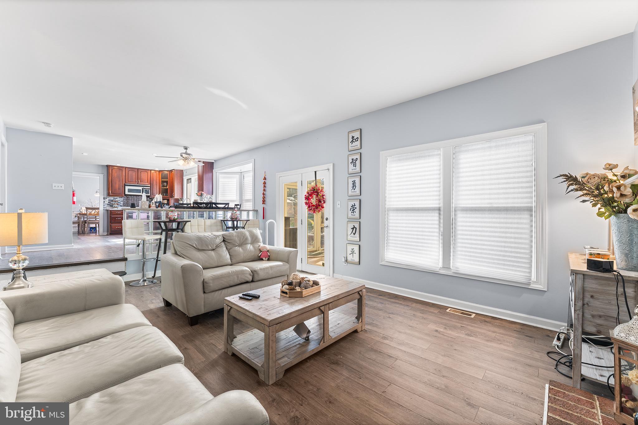 106 Bunning Drive Voorhees, NJ 08043 - Photo 21 of 45 a living room with furniture and a window