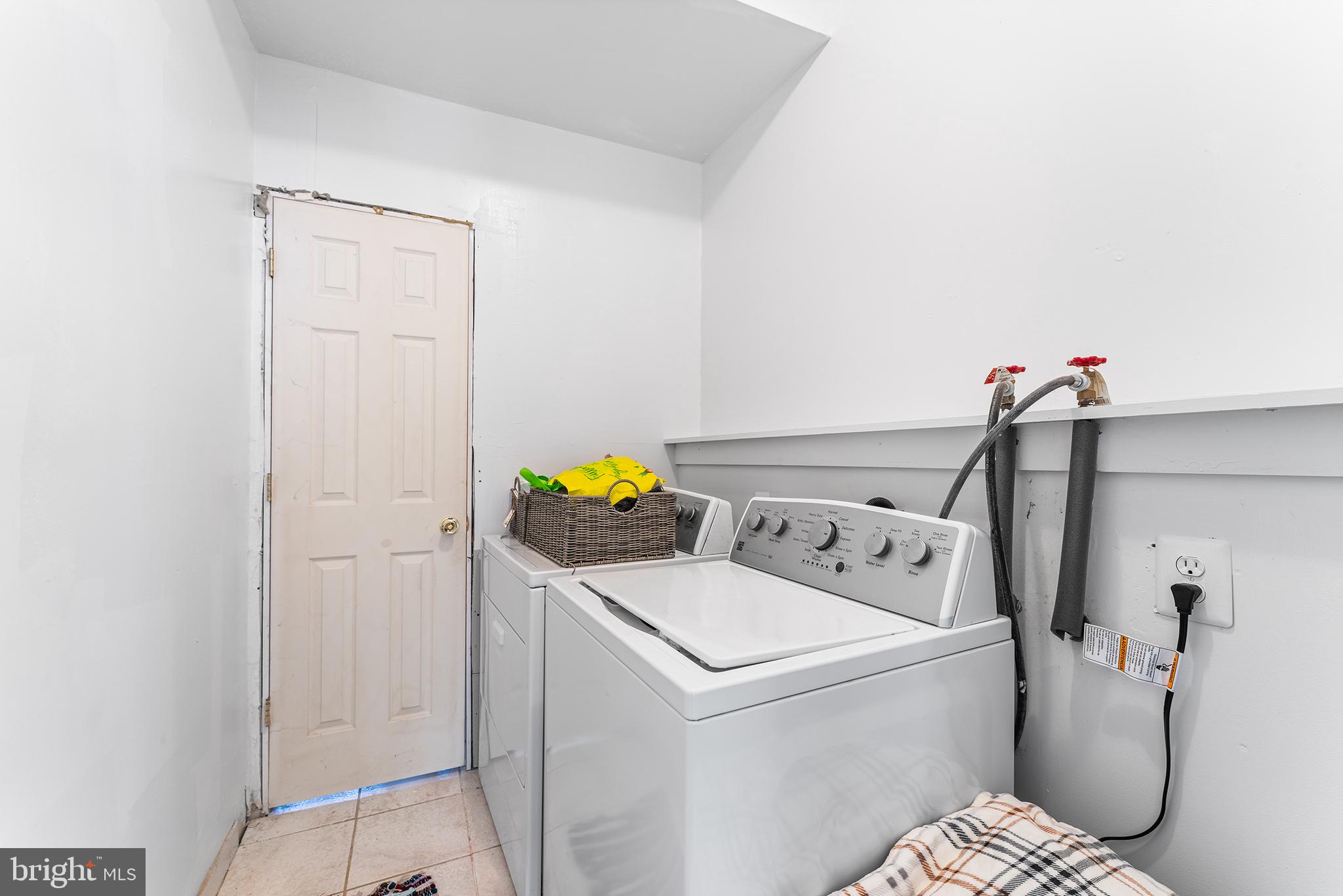 106 Bunning Drive Voorhees, NJ 08043 - Photo 22 of 45 a utility room with dryer and washer