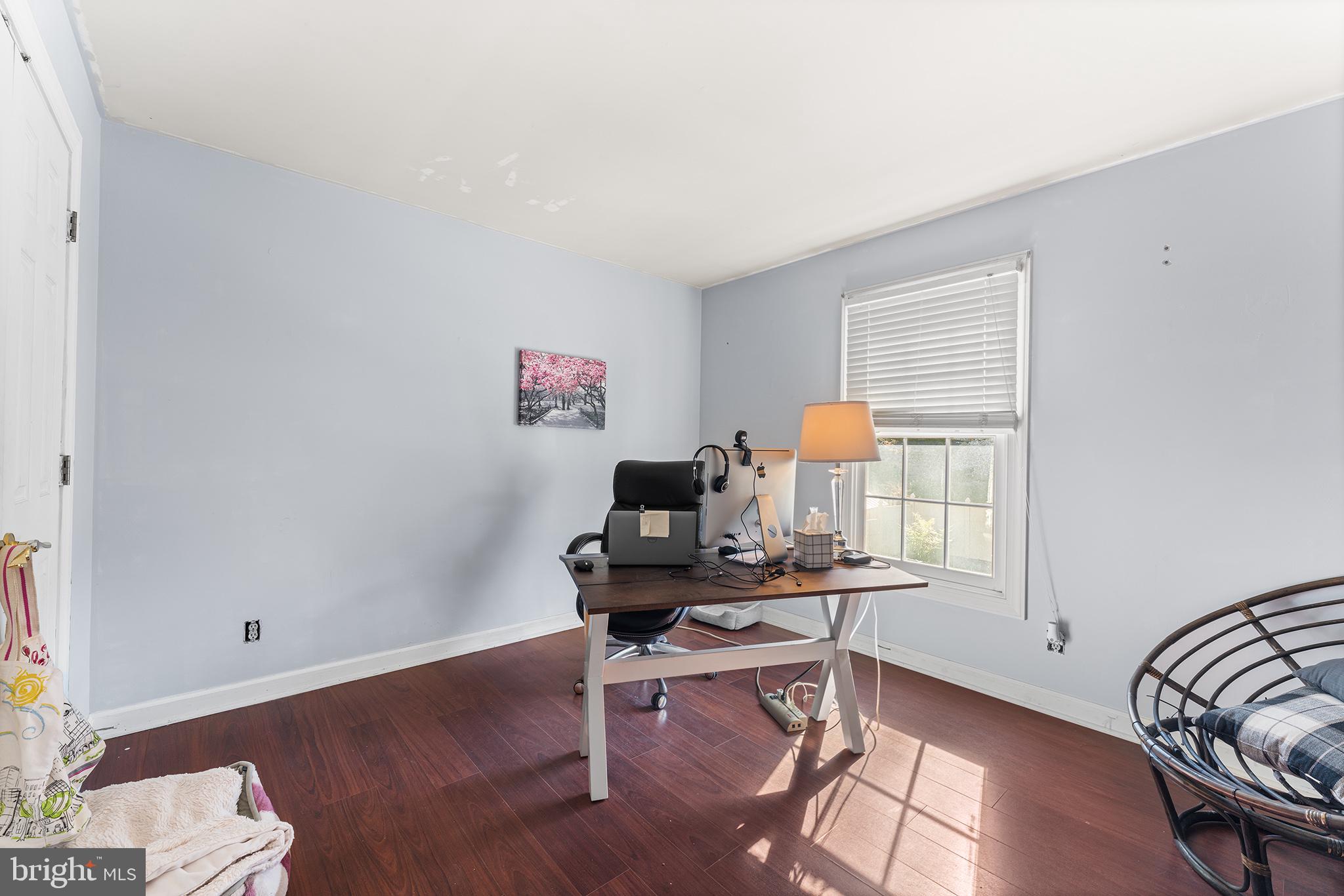 106 Bunning Drive Voorhees, NJ 08043 - Photo 33 of 45 a workspace with furniture and wooden floor