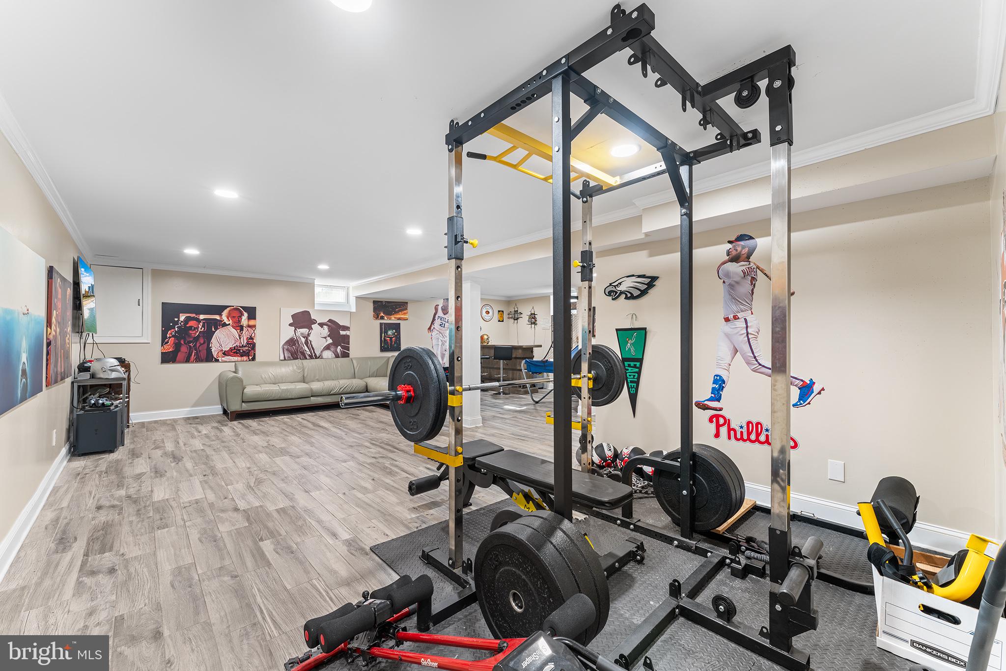 106 Bunning Drive Voorhees, NJ 08043 - Photo 37 of 45 a room with gym equipment and a large window