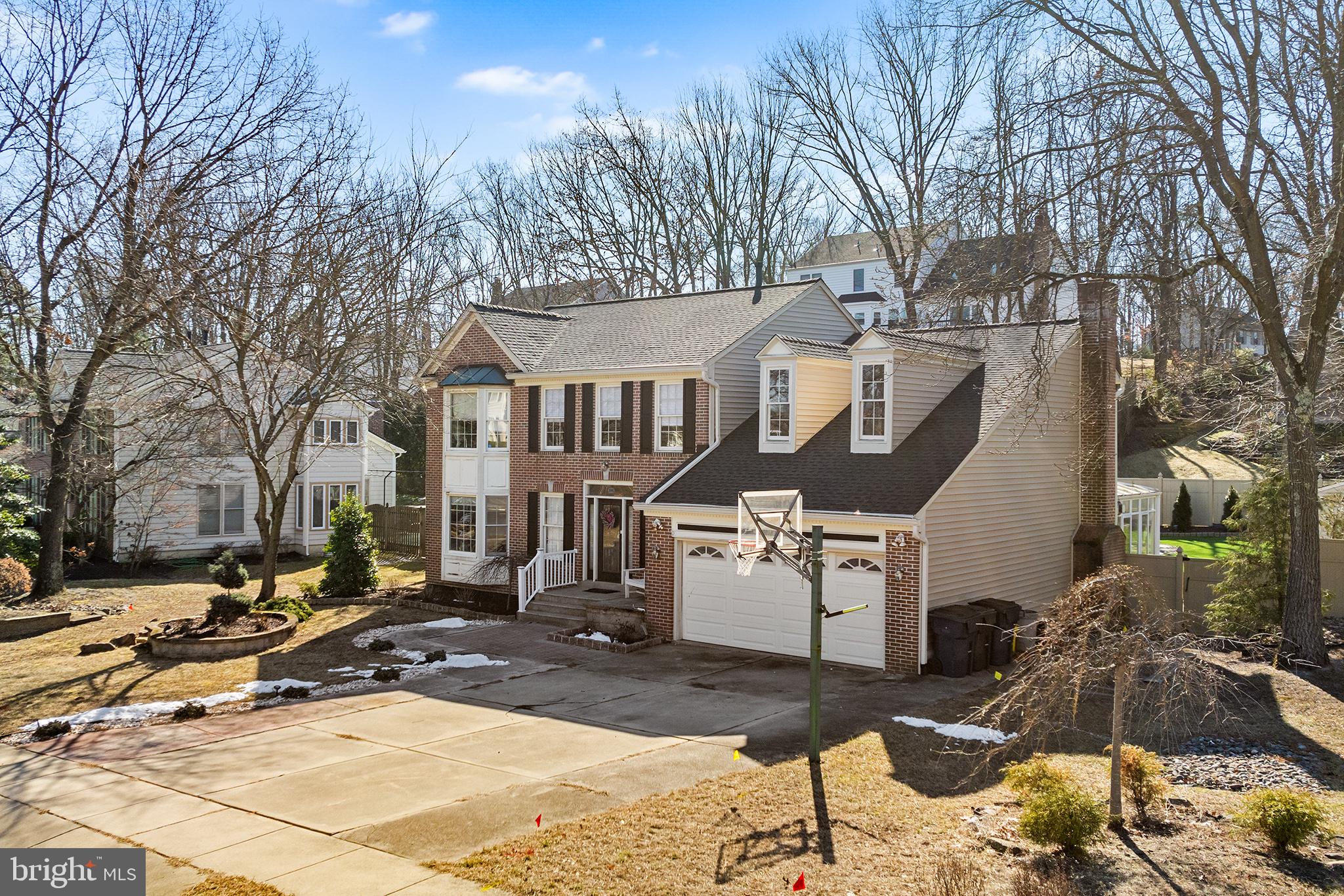 106 Bunning Drive Voorhees, NJ 08043 - Photo 6 of 45 a view of a street with sitting area