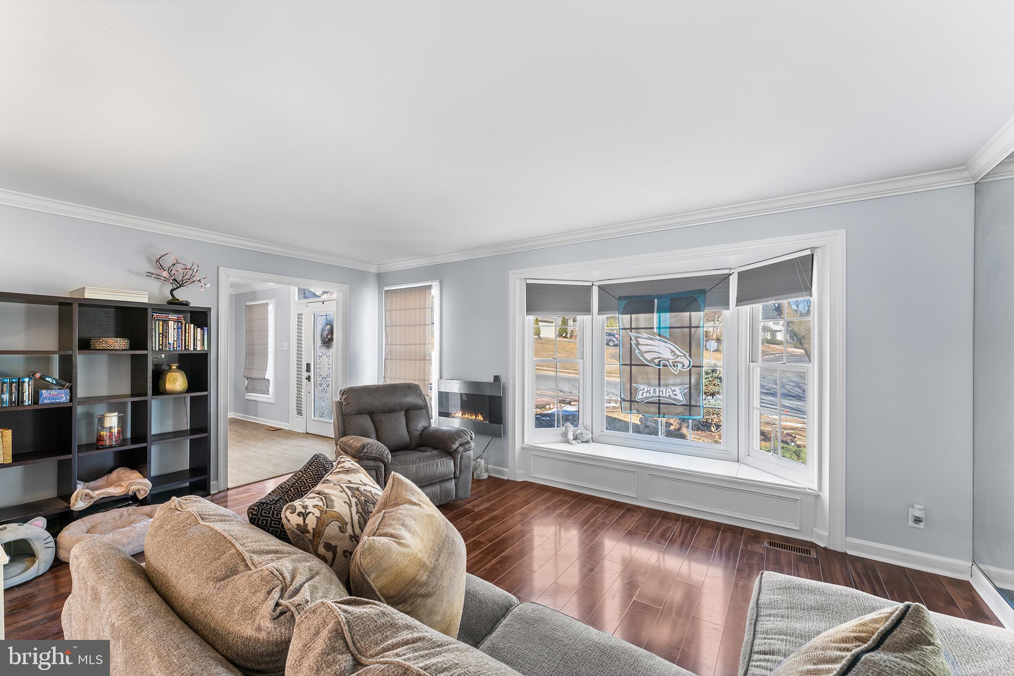 106 Bunning Drive Voorhees, NJ 08043 - Photo 9 of 45 a living room with furniture and a window