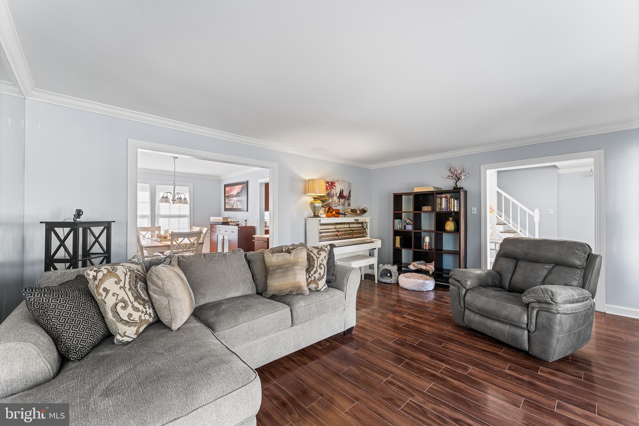 106 Bunning Drive Voorhees, NJ 08043 - Photo 10 of 45 a living room with furniture and hard wood flooring