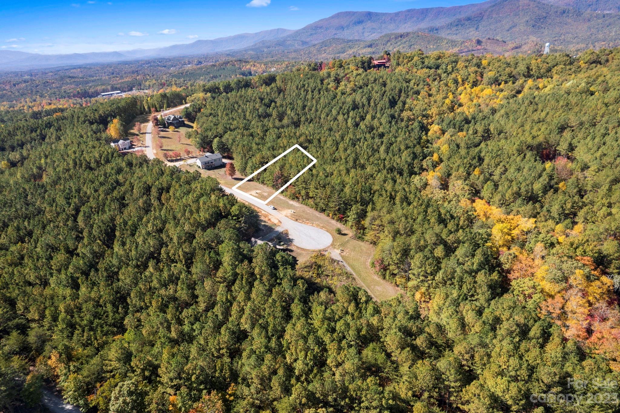 0 Palisade Drive, Unit 23 Rutherfordton, NC 28139 - Photo 2 of 9 view of a city with lush green forest
