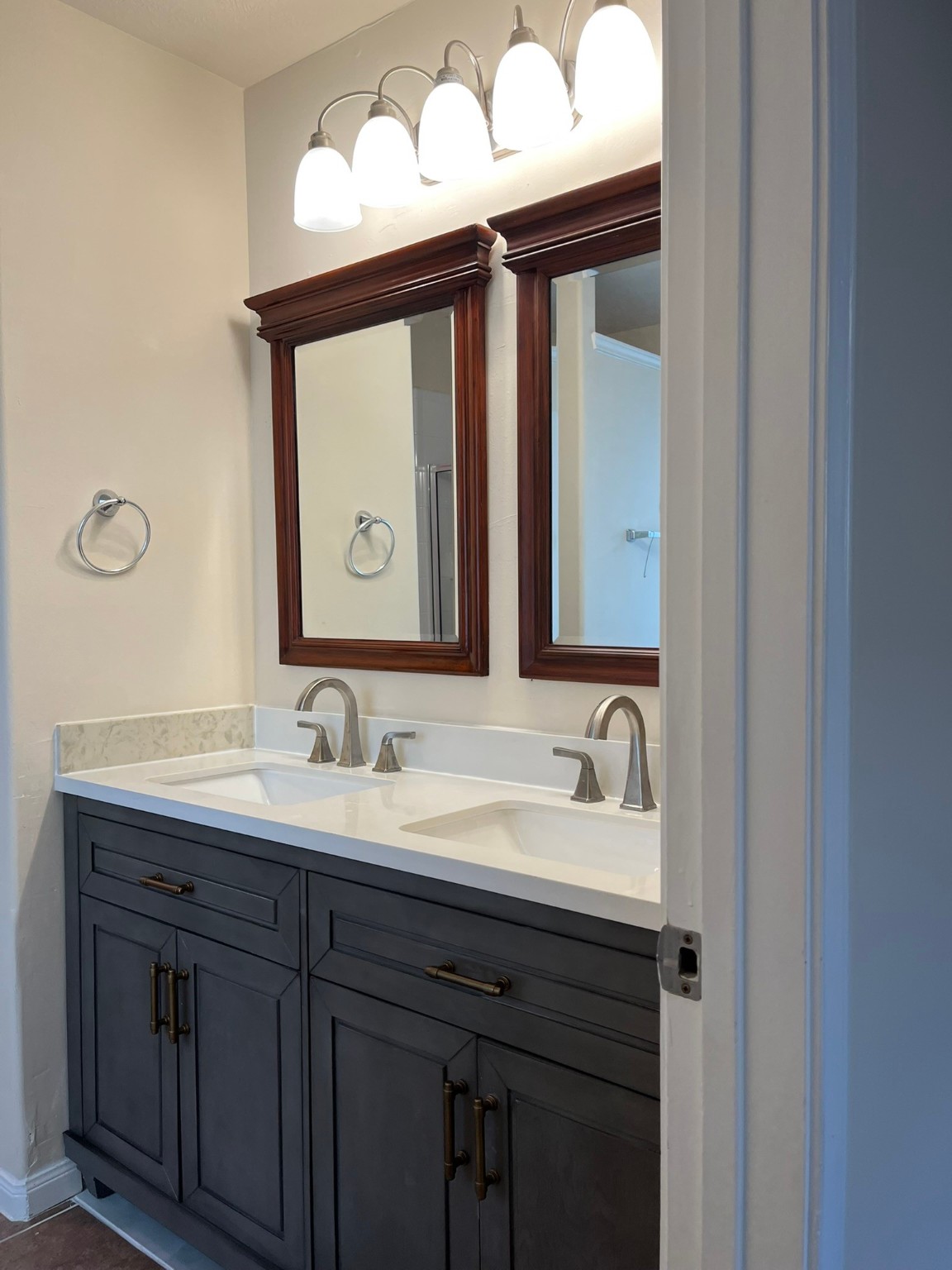 21650 Falvel Sunset Court Spring, TX 77388 - Photo 17 of 39 a bathroom with a double vanity sink and a mirror