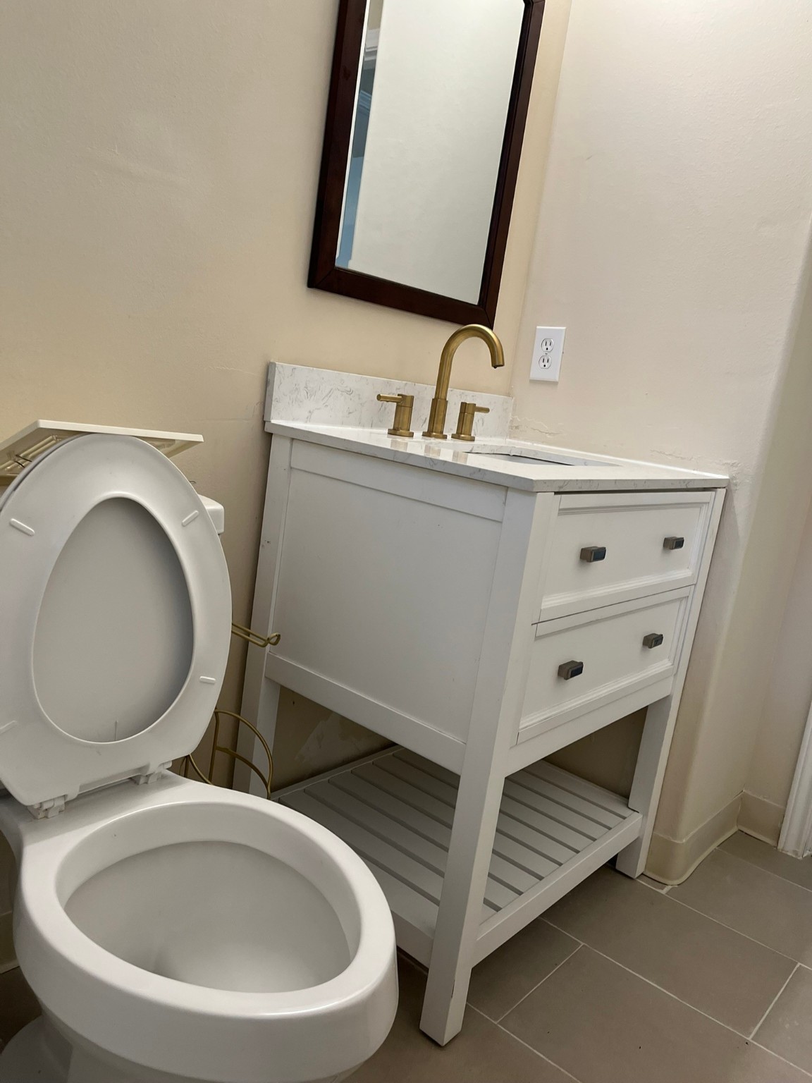 21650 Falvel Sunset Court Spring, TX 77388 - Photo 28 of 39 a bathroom with a toilet sink and mirror