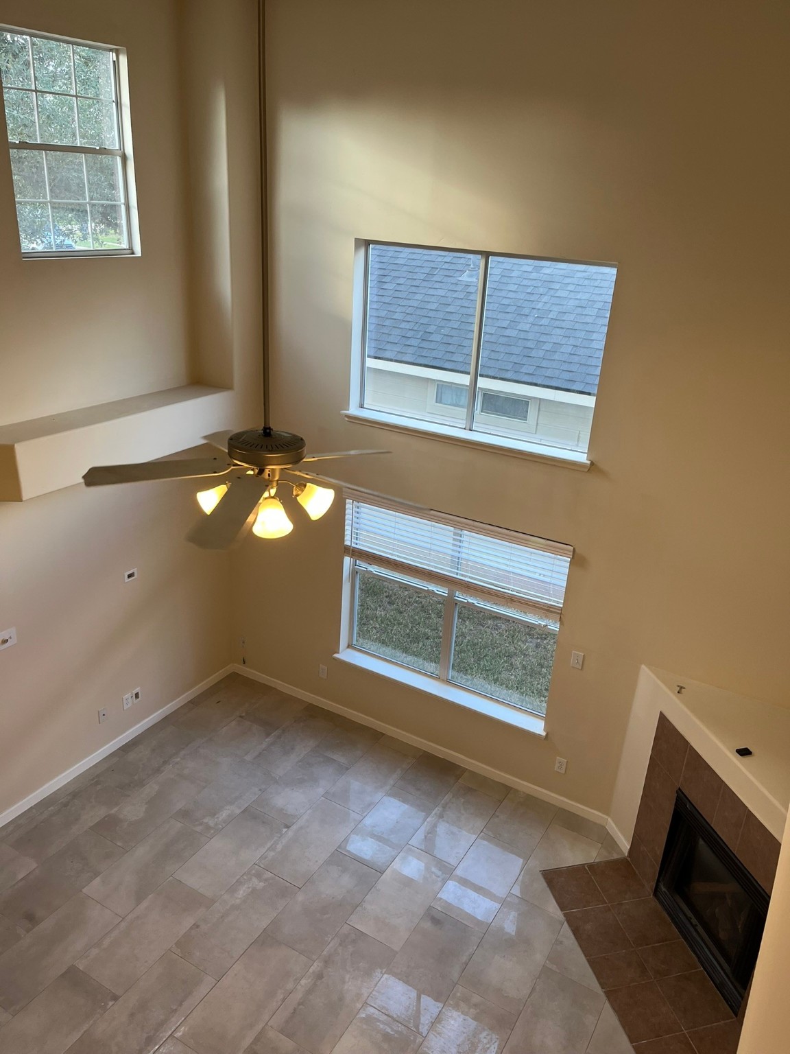 21650 Falvel Sunset Court Spring, TX 77388 - Photo 6 of 39 a view of a livingroom with an empty space and a fireplace