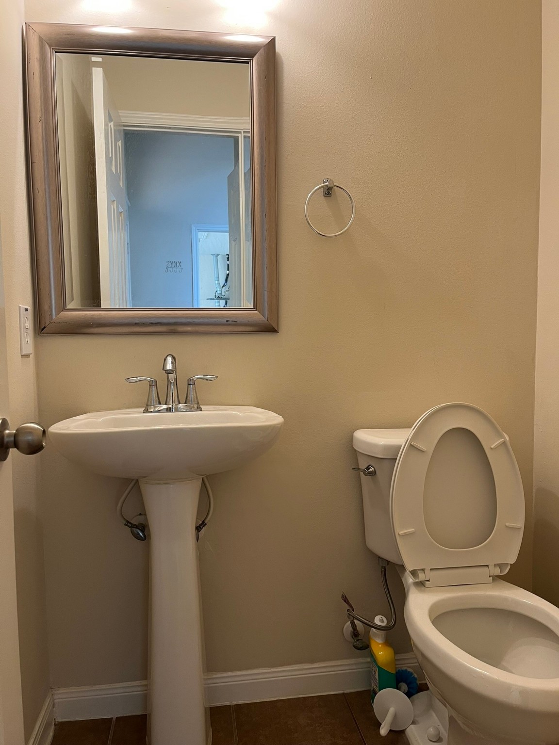 21650 Falvel Sunset Court Spring, TX 77388 - Photo 8 of 39 a bathroom with a toilet sink and mirror