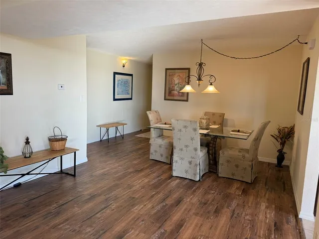 a room with furniture and wooden floor