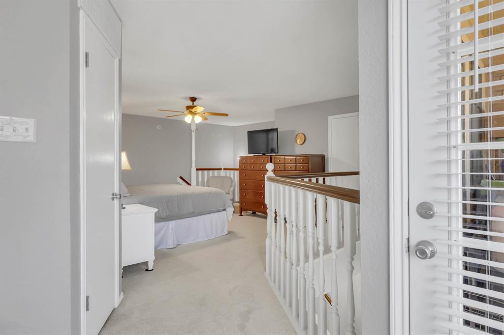 14333 Preston Road, Unit 2103 Dallas, TX 75254 - Photo 16 of 19 a living room with furniture and a window