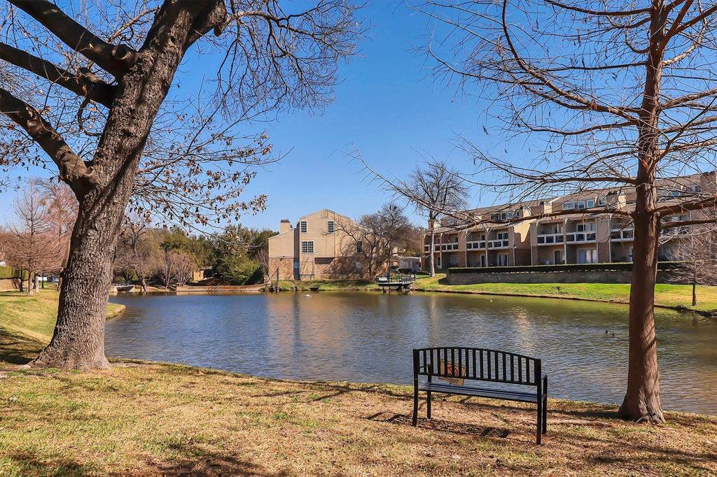 14333 Preston Road, Unit 2103 Dallas, TX 75254 - Photo 2 of 19 a view of a lake with a bench in the patio