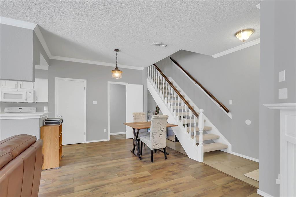 14333 Preston Road, Unit 2103 Dallas, TX 75254 - Photo 4 of 19 a view of entryway and hall with wooden floor