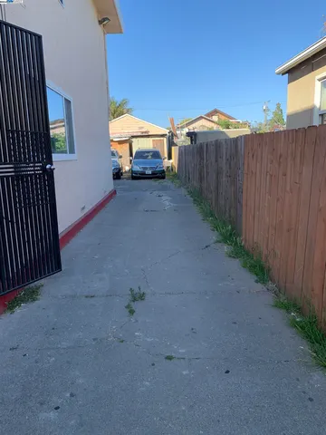 a view of yard with barbeque and trees