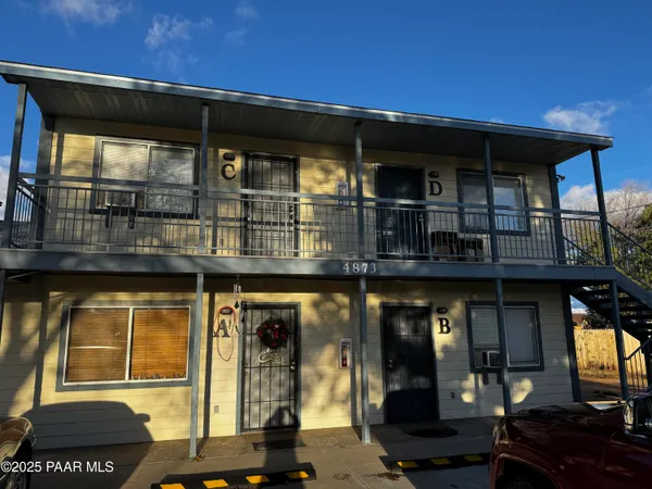 a front view of a house with a porch