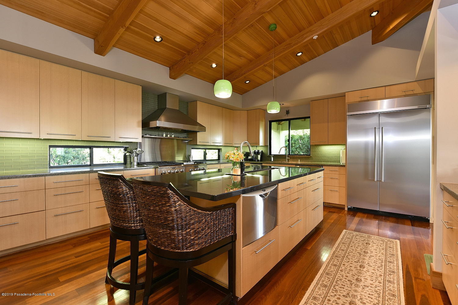 1825 Braemar Road Pasadena, CA 91103 - Photo 12 of 82 a kitchen with stainless steel appliances granite countertop a sink a stove and a refrigerator